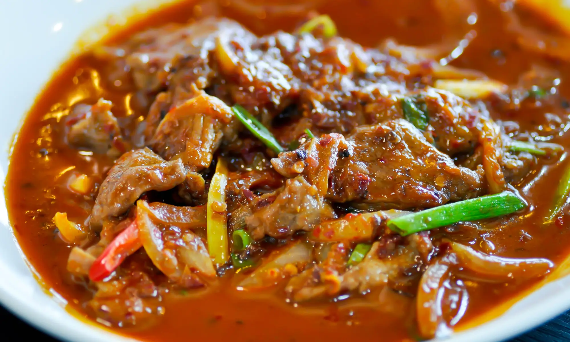 Comment réussir un délicieux sauté de porc au curry ?